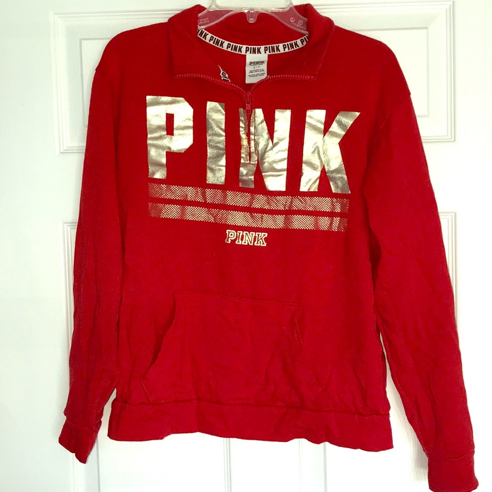 Red long sleeve half zip sweater.